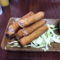 6 Pieces Shanghai Rolls · Deep fried lumpia with ground pork, carrots and onions.