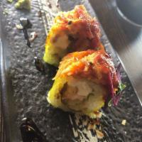 Hot Orgasm Roll · 8 pieces. Tempura green chili with cream cheese, shrimp and topped with spicy kani and baked...