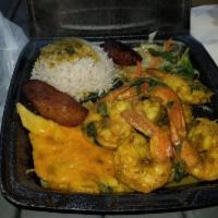 Curry Shrimp · Served with jasmine rice, macaroni pie and sauteed cabbage or spinach.