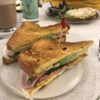 Club Sandwich · Eggs, ham, cheese, lettuce and tomato.