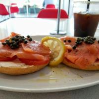 Salmon Bagel · Bagel topped with cream cheese, smoked salmon, capers, red onions, tomatoes, salt, pepper an...