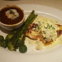 Chicken Oscar · Grilled, topped with lump crabmeat and bearnaise, served over lemon butter thyme sauce with ...