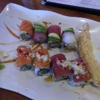 Wasabi Roll · Fresh lobster meat, shrimp and cucumber inside, topped with avocado, wasabi sauce and wasabi...