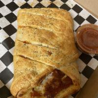 Stromboli · Pizza crust filled with mozzarella and marinara. Served with a side of marinara.