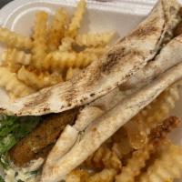 Falafel Sandwich · Five patties of ground garbanzo beans mixed with blend of spices and fried. Served in a pita...