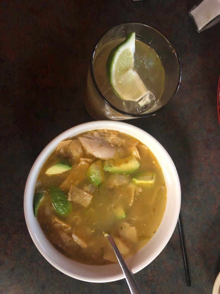 Tortilla Soup · Shredded chicken in a savory broth topped with tortilla chips, cheese and avocado slices. Served with a side of rice.