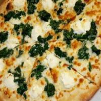 Spinach Pizza · Fresh baby spinach, ricotta cheese, Parmesan cheese, white olive oil sauce.