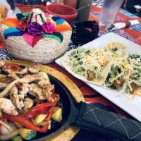 Chicken Fajitas · Sauteed onions, red pepper, green pepper, grilled and succhini, served with 4 flour tortilla...