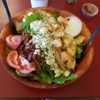 Cobb Salad · Romaine, grilled chicken, crumbled bacon, blue cheese, egg and tomato.