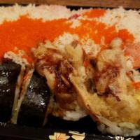 Twin Salmon Roll · Fresh salmon avocado inside, torched fresh salmon on top, yuzu cream, eel sauce, tempura bit...