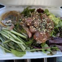 Hoke Poke · Served with surimi crab, ahi tuna, goma seaweed, cucumber, ginger guac and poke sauce.