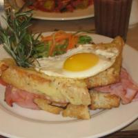 Croque Monsieur Sandwich · Country bread with ham and cheese toasted. Served with organic mixed green salad.