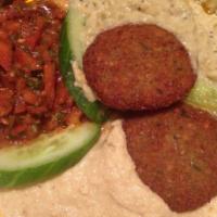 Mixed Meze Platter · Hummus, babaghannush, ezme, sigara borek, falafel and feta cheese. Served with pita bread. H...