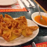 A-5 Crab Rangoon · Fried wonton wrapper filled with crab and cream cheese.