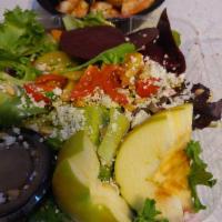 Beet Salad · Organic mixed greens, arugula, beets, pine nuts, apples, Gorgonzola, balsamic vinaigrette.