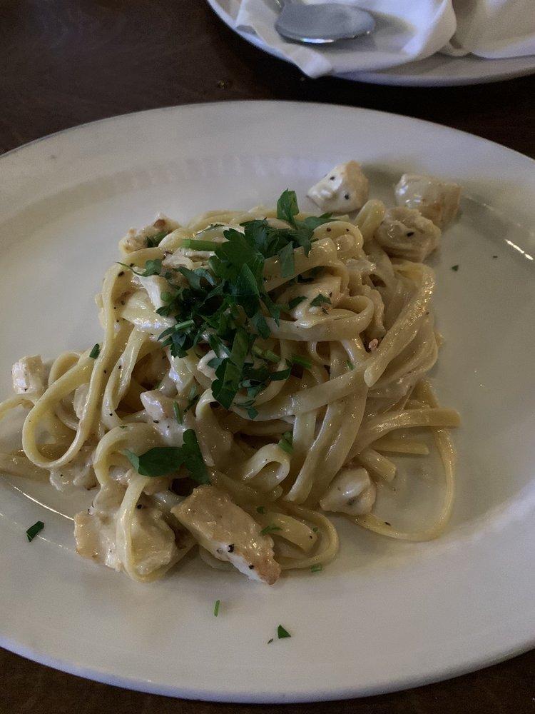 Fettuccine · Jumbo scallops, shrimp, chopped tomato, garlic, white wine ,sauteed with green and white fettuccine pasta.