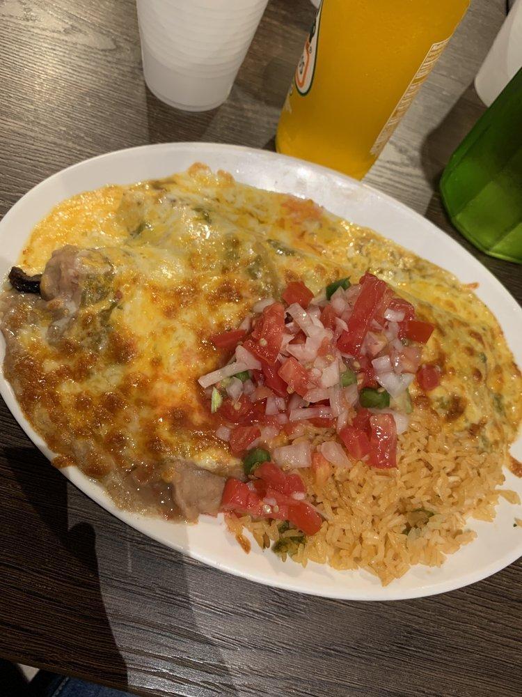 Smothered Burrito Platter · Flour tortilla rolled around with filling of choice, served with rice, beans and pico de gallo.