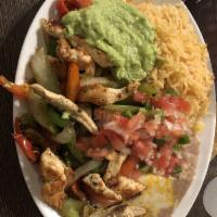 Fajitas · Grilled bell peppers, onions, served with rice, beans, guacamole, pico de gallo and tortillas.