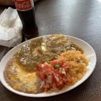 Huevos Rancheros · 2 fried corn tortillas, 2 eggs, topped with green chile sauce, rice, beans, pico de gallo an...