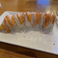 Shaggy Dog Roll · Inside: shrimp tempura and avocado. Top: crab stick, spicy mayo and chili powder.