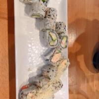 Crunchy Roll · Marinated crab mix, cucumber and topped with crunchy flakes.