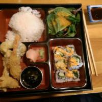 Shrimp Tempura Roll · Inside: shrimp tempura, asparagus and avocado. Top: potato flakes, eel sauce and crunchy fla...