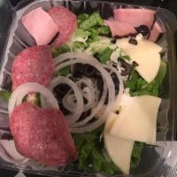 Antipasto Salad · Mixed lettuce, salami, mozzarella, artichokes, tomato wedges & black olives, served with our...