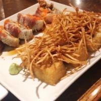 Vegas Roll · Soft shell crab tempura, crab stick, avocado topped with tuna, masago, spicy mayo, wasabi an...