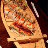 Sushi Boat For 2 Combo · 14 pieces of assorted nigiri, 9 pieces of sashimi and 3 rolls of chef's choices. Served with...