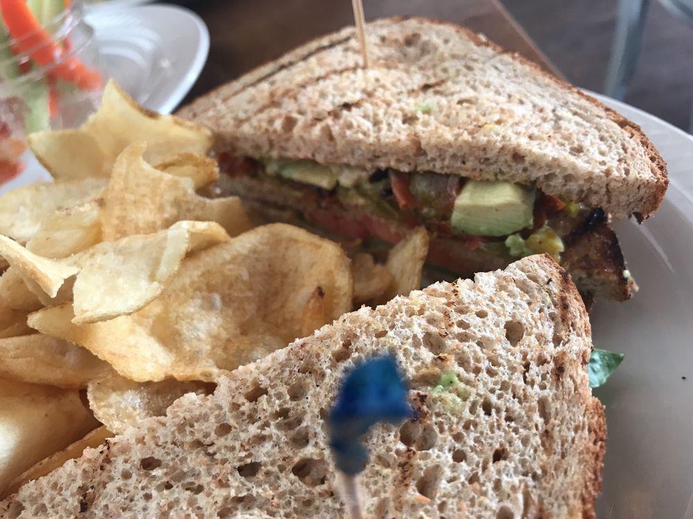 Comfort Club · Toasted Multigrain Triple Decker, Carrot bacon, Lettuce, Tomato, Avocado, Green Chile and Chipotle Mayo.  Served with Housemade potato chips.