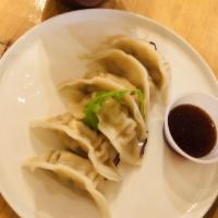 Dumplings · 6 pieces. Fried or steamed. Juicy dumpling filled with your choice of beef, pork, shrimp, ve...