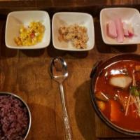 Kimchi Stew · Traditional staple korean stew of simmered pork with kimchi (spicy fermented napa cabbage). ...