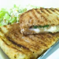 Eggplant Panini · A perfect lunch panini made with a thick slice of breaded eggplant, vine ripened tomatoes, c...