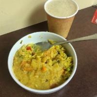 Yellow Lentil Soup · Yellow lentil or daal cooked with crushed ginger and roasted garlic with onions and tomatoes...