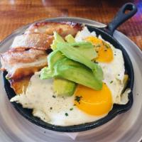 Brecky Skillet · Pork belly, seasoned potatoes, peppers, tomatoes, cheddar, onions, avocado and 2 eggs.