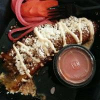 San Pedro Sula · Ripe plantain sliced down the middle and stuffed with ground beef, dry cheese and Honduran c...