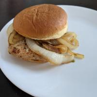 Maxwell Street Pork Chop Sandwich · Tender and juicy pork chop marinated and grilled to perfection, topped with grilled onions a...