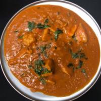 Chicken Curry · Mildly spiced with turmeric, onion, ginger, garlic, coriander and cumin, in a special curry ...