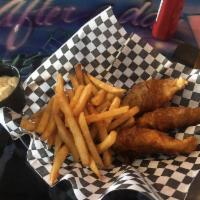 Fish and Chips · Fresh fish hand dipped in our house made beer batter and fried golden perfection. Served wit...