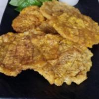 Tostones · Fried plantain.