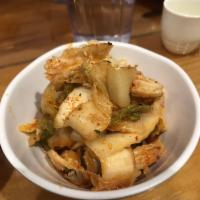 Kimchi · A spicy pickled napa cabbage side dish.