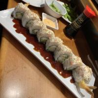 White Dragon Roll · Shrimp tempura, avocado, cucumber, cream cheese topped with crab mix, unagi sauce and chipot...