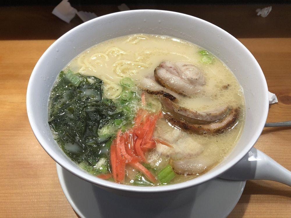 Classic Tonkotsu Ramen · Egg noodles in tonkotsu broth (pork marrow) served with our house-made chashu (braised pork belly), beni shoga (pickled ginger), green onion, and wakame (seaweed).