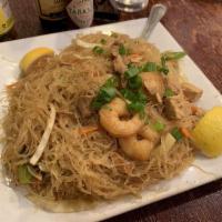 Pancit Bihon · Rice noodle sauteed with vegetables, pork, chicken and shrimp.