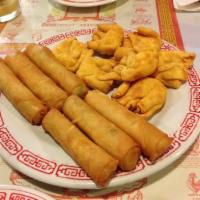 A1-1. Vegetable Egg Roll · Crispy dough filled with minced vegetables.