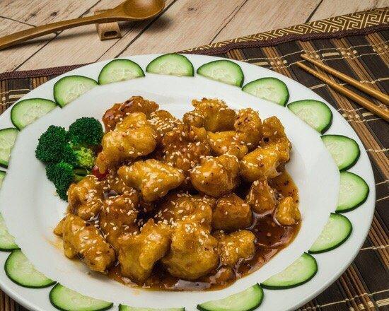 Sesame Chicken · Chunk chicken sauteed with chef's special sauce, topped with sesame seeds.