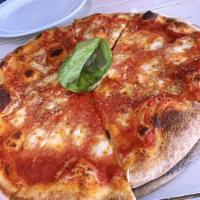Margherita Pizza · Tomato sauce, mozzarella and basil. Napoletana flour.