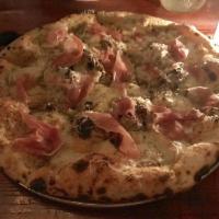 Cheesus Christ Pizza · Mozzarella, taleggio, Parmigiana, black pepper and cream.
