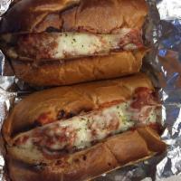 Meatball Sub · Sliced meatballs smothered in marinara sauce topped with mozzarella cheese and baked in our ...
