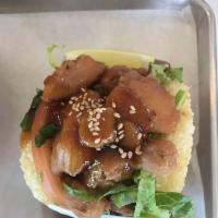 BBQ Chicken Bun Burger · Korean BBQ chicken, cilantro tomato, soy ginger slaw, ponzu garlic spread, gochujan, toasted...